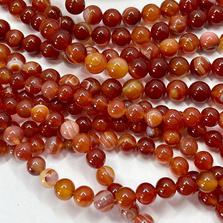 Сердолик полосатый (красный агат) круглый гладкий, нить 38 см